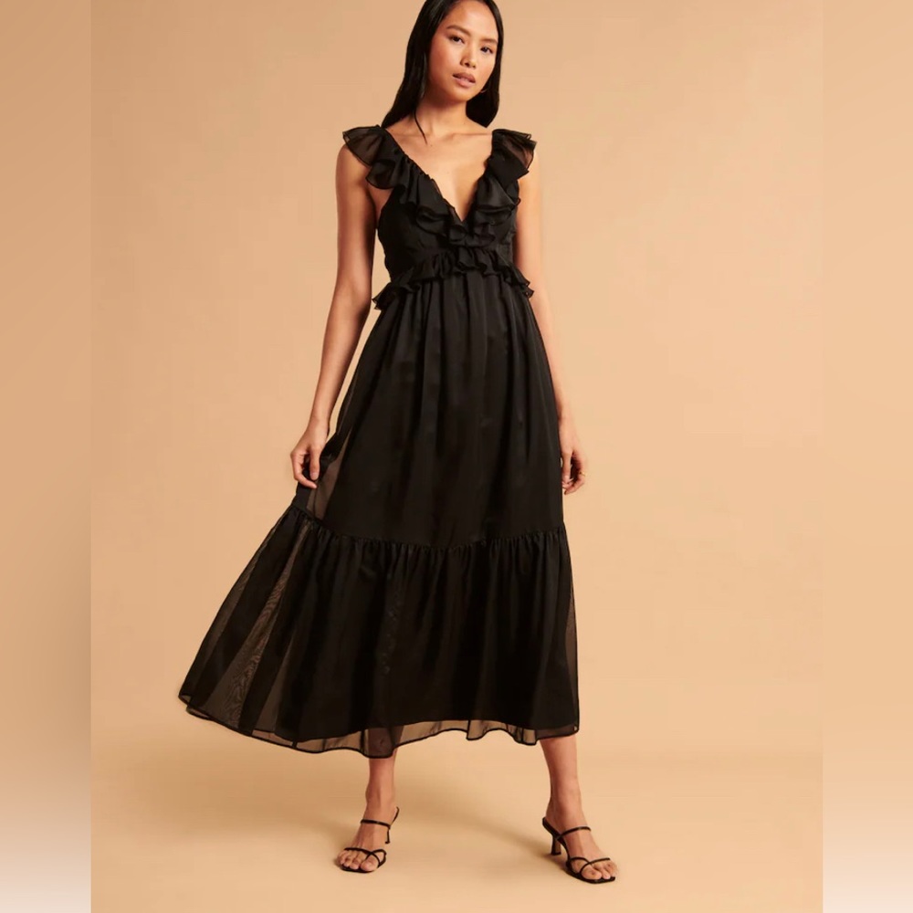 Abercrombie black ruffle halter dress. Never worn, tags removed